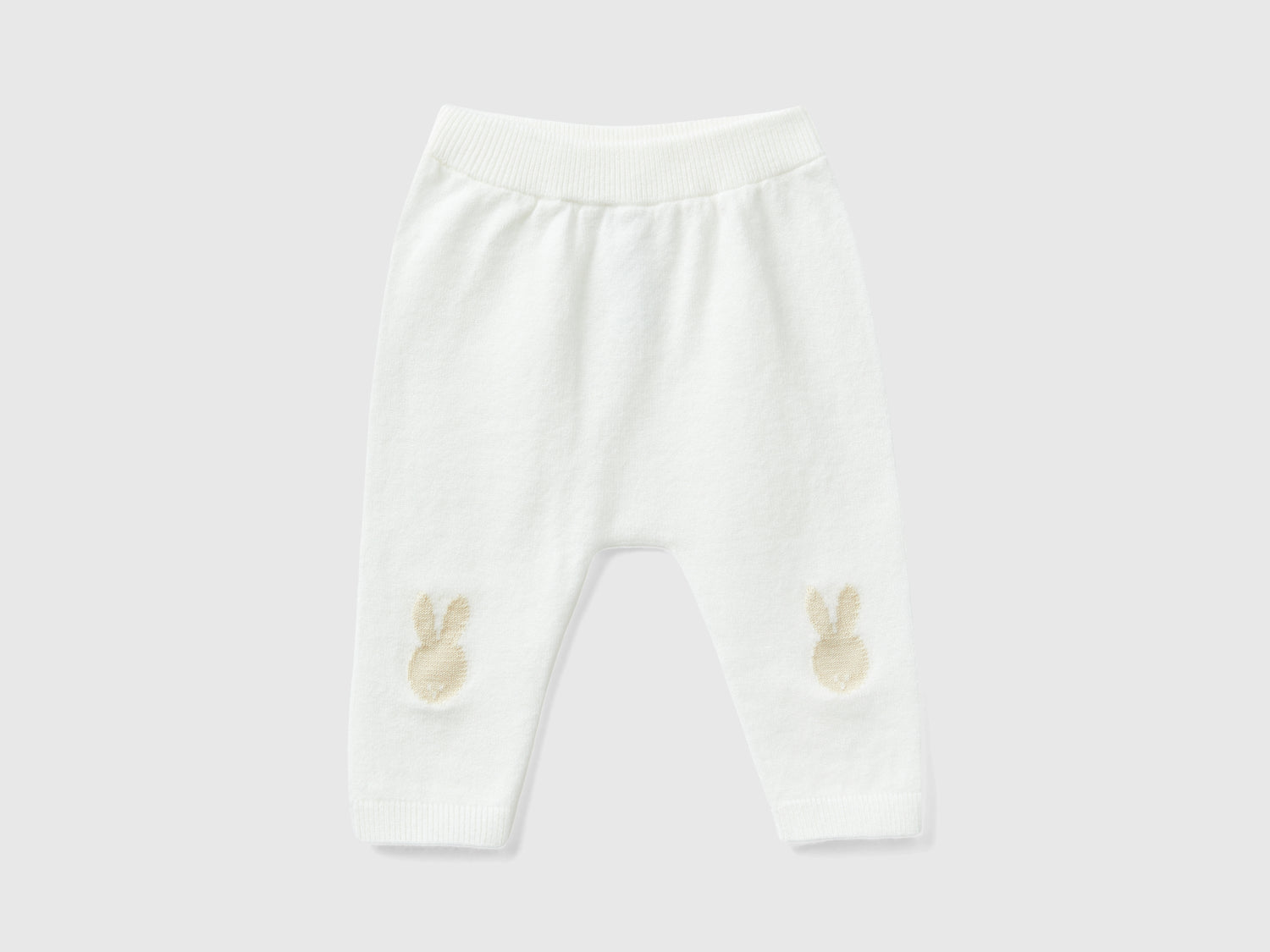 Pantalones de punto con inserción da neonato bianco panna | Benetton Outlet