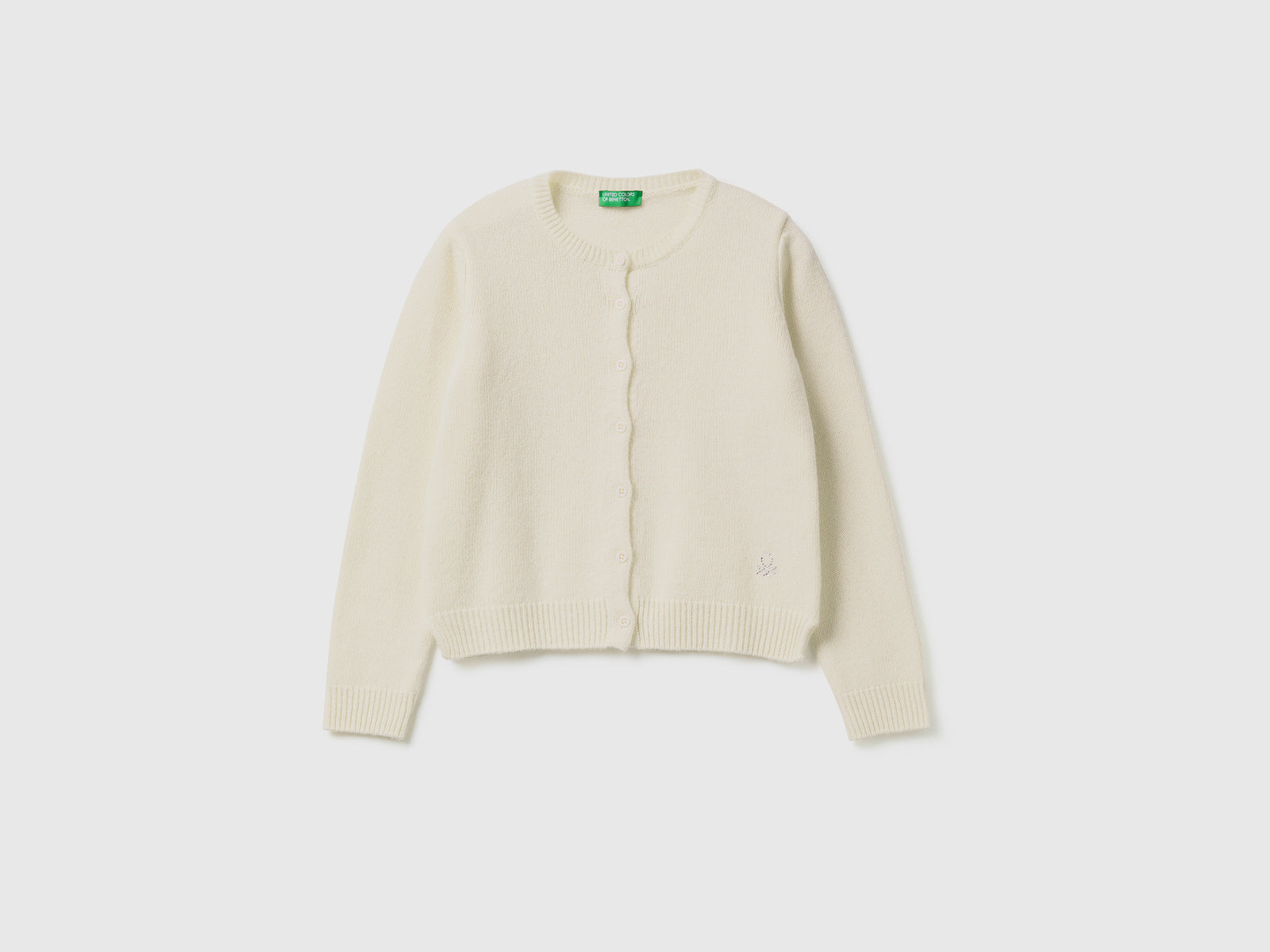 Cardigan girocollo con logo in strass da bambina bianco panna | Benetton Outlet