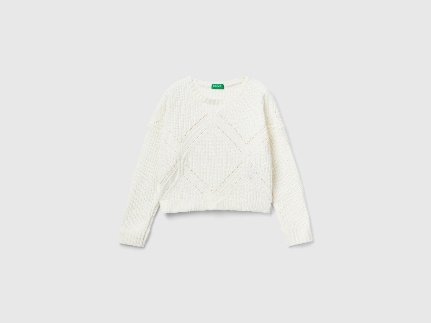 Maglia boxy fit in ciniglia da bambina bianco panna | Benetton Outlet