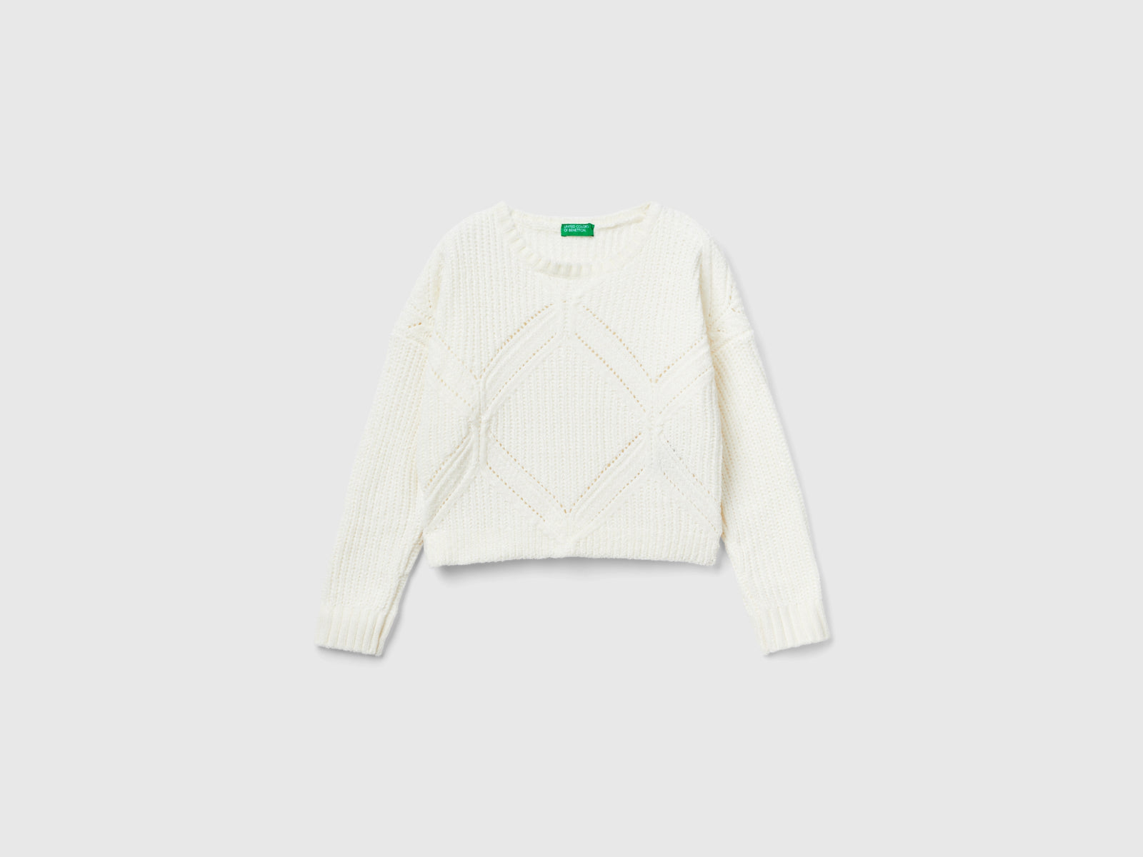 Maglia boxy fit in ciniglia da bambina bianco panna | Benetton Outlet