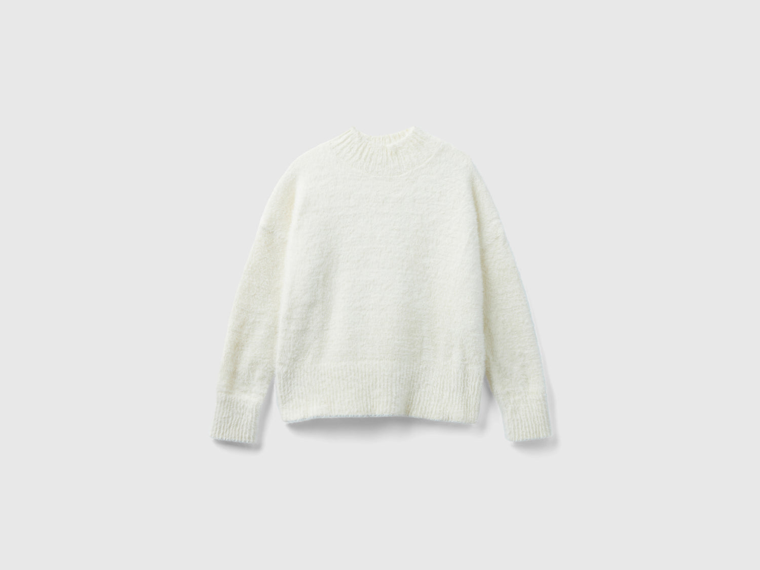Maglia lupetto in filato peloso da bambina bianco | Benetton Outlet