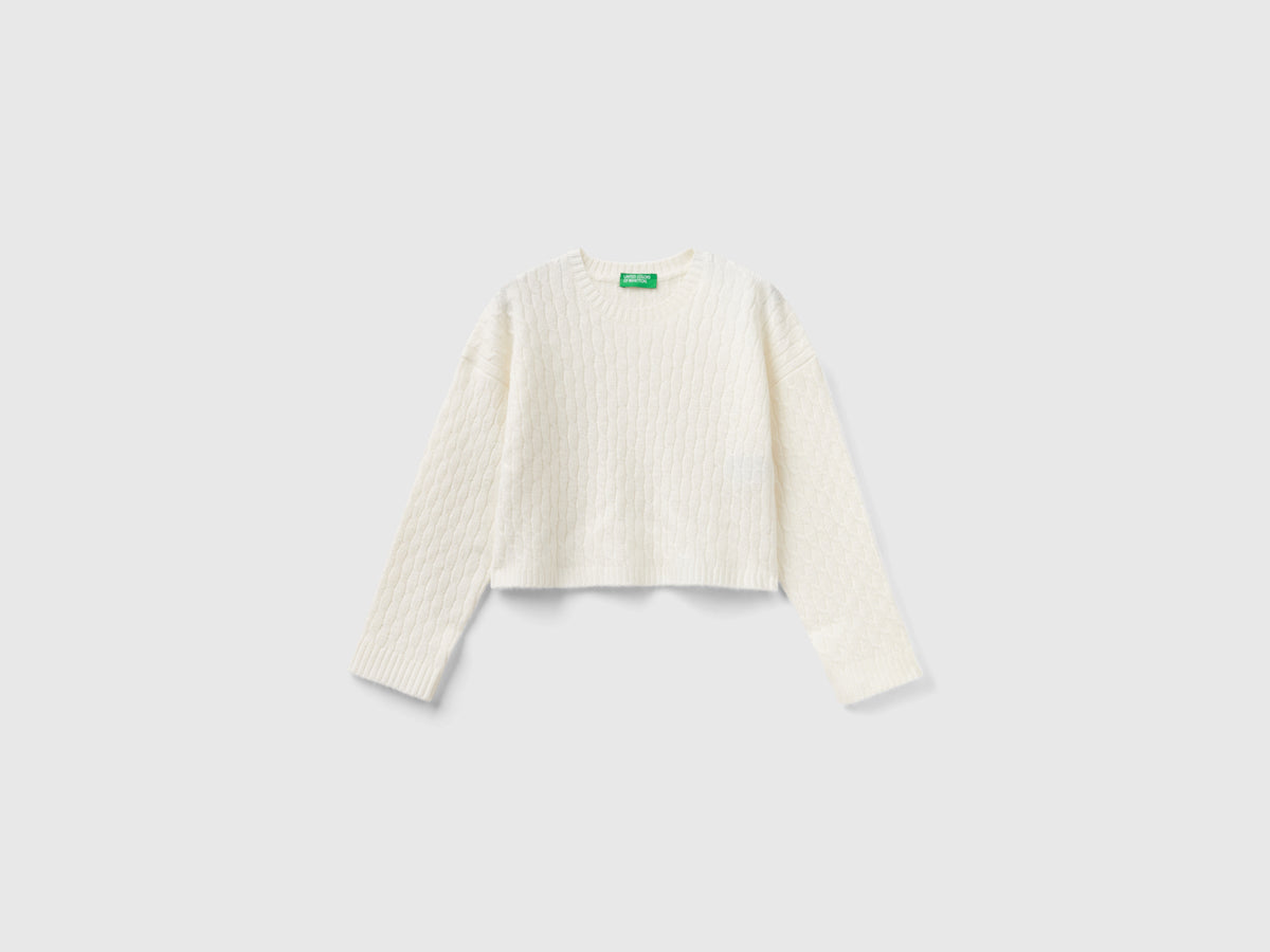 Maglione con trecce