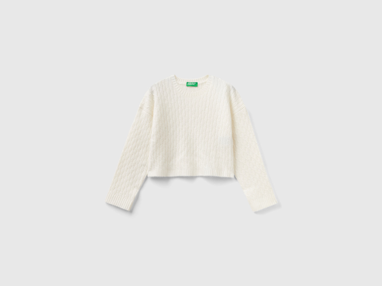 Maglione con trecce da bambina bianco panna | Benetton Outlet