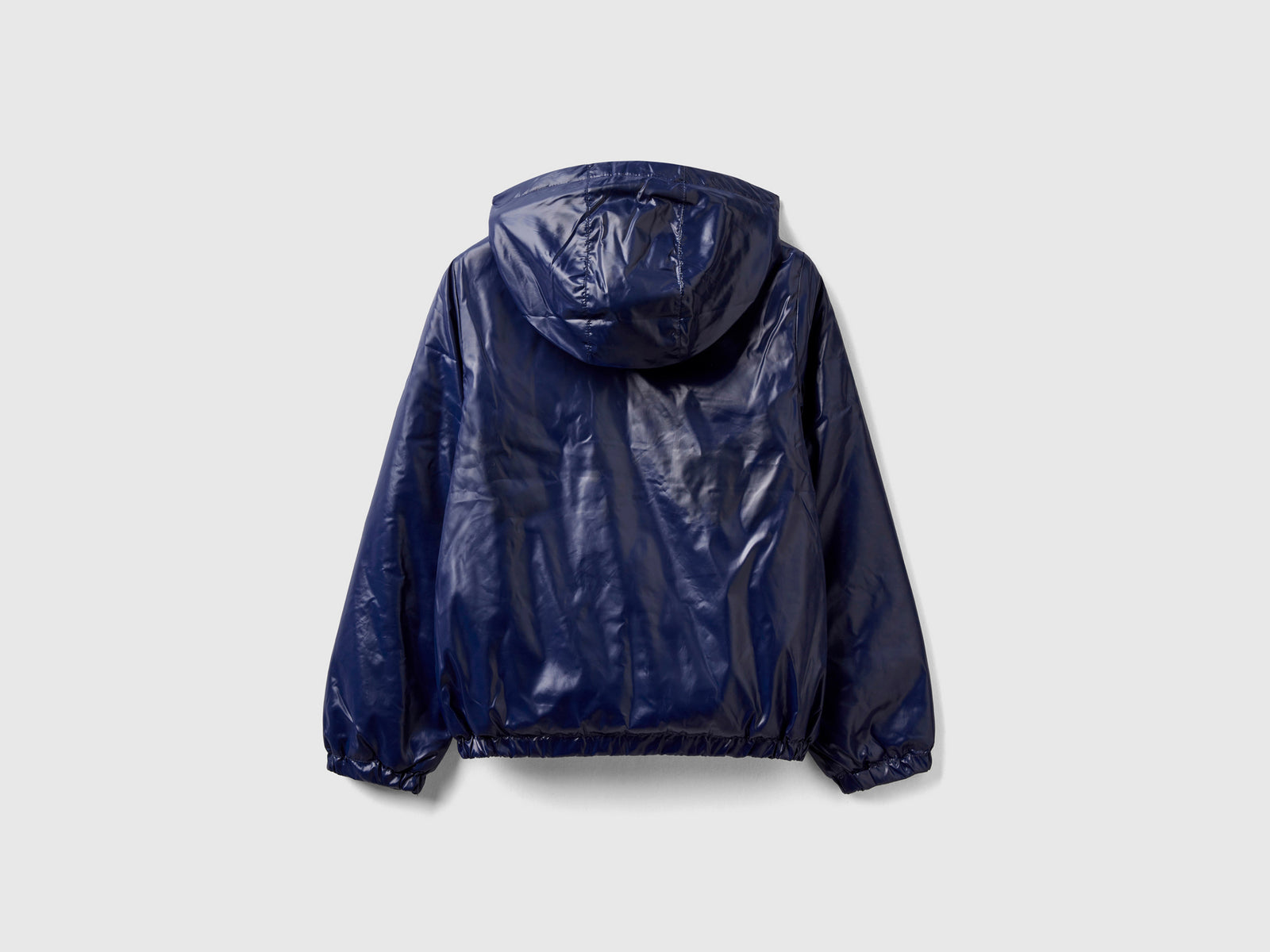 Giubbino lucido con zip e cappuccio da bambina blu scuro 2 | Benetton Outlet