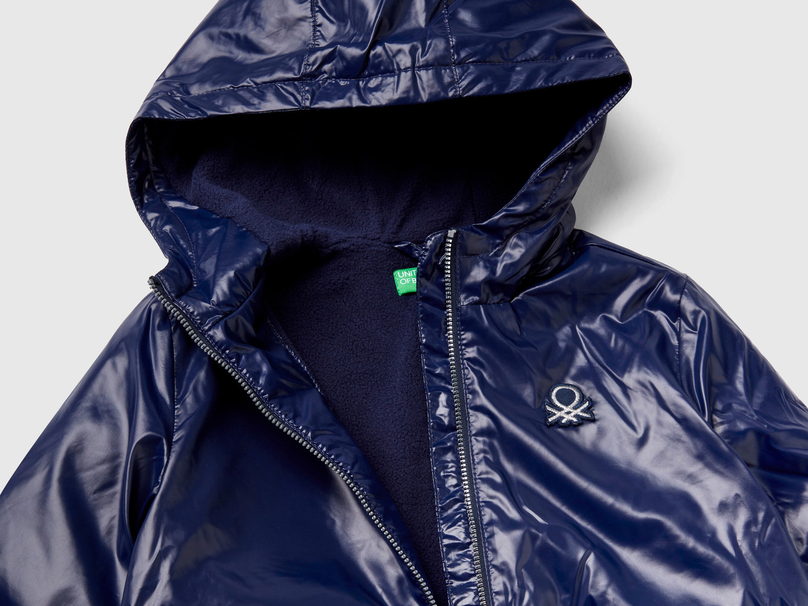 Giubbino lucido con zip e cappuccio da bambina blu scuro 3 | Benetton Outlet