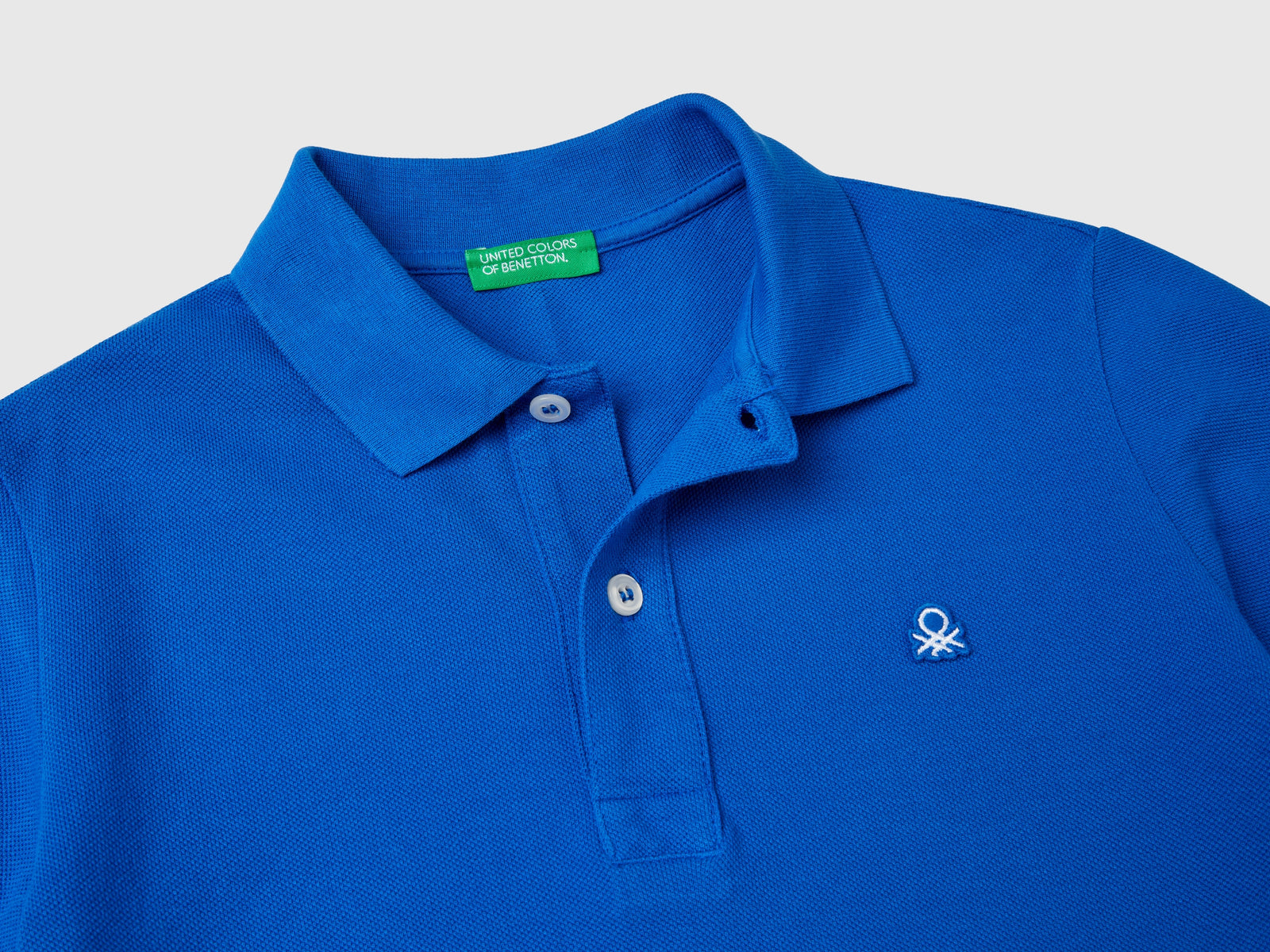 Polo slim fit 100% cotone bio da bambino bluette 2 | Benetton Outlet