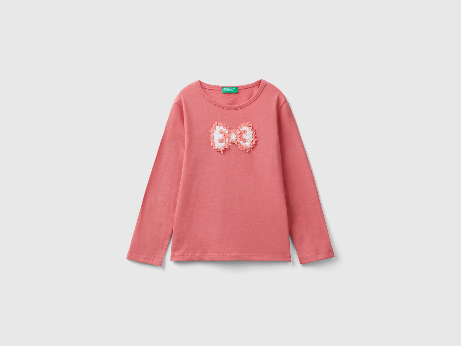 T-shirt con applicazione effetto petali da bimba salmone | Benetton Outlet