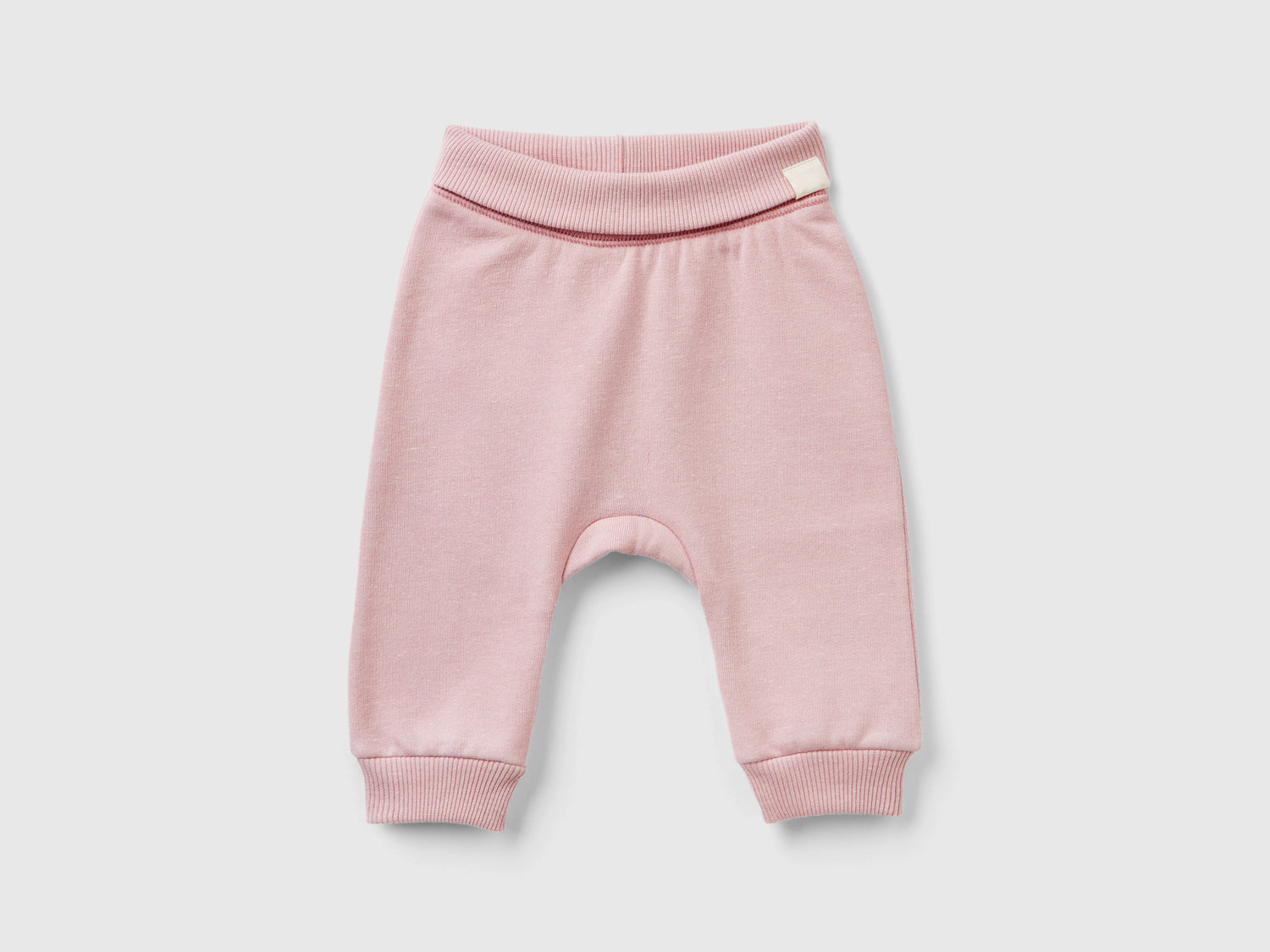 Joggers in tessuto riciclato da neonato rosa | Benetton Outlet