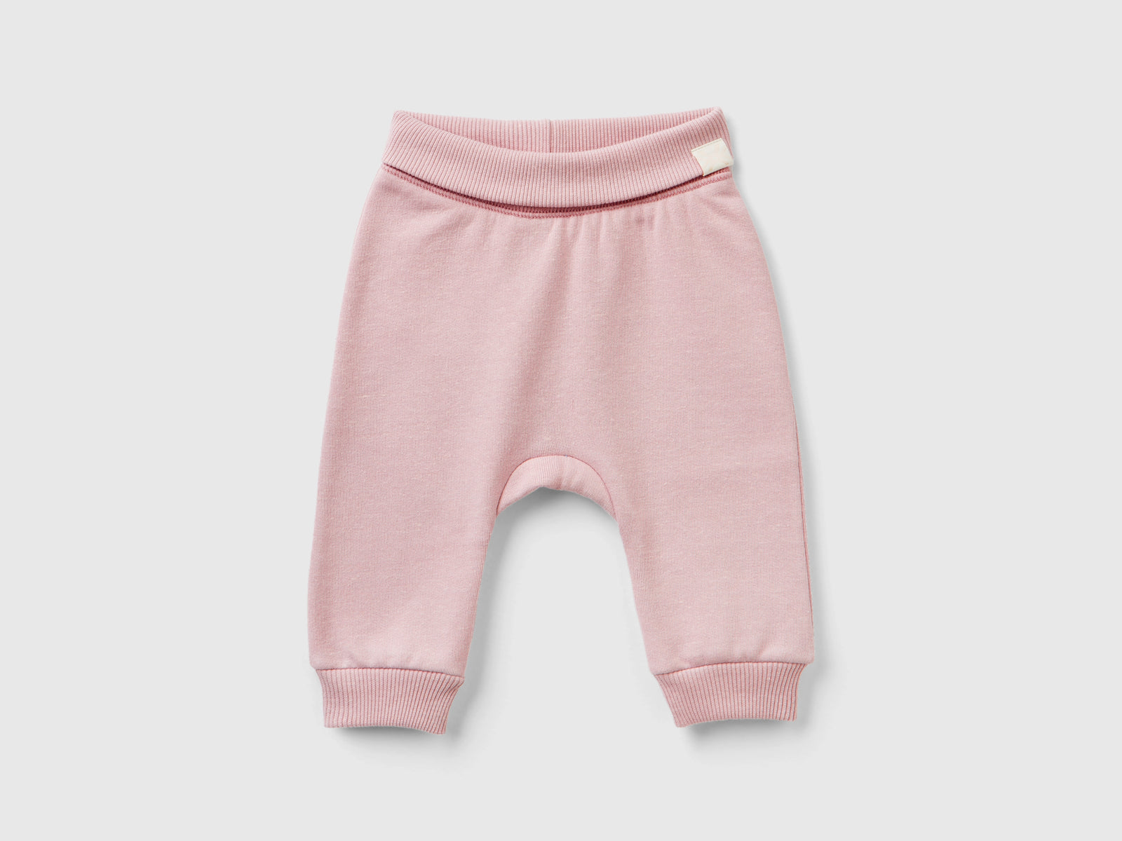 Joggers in tessuto riciclato da neonato rosa | Benetton Outlet