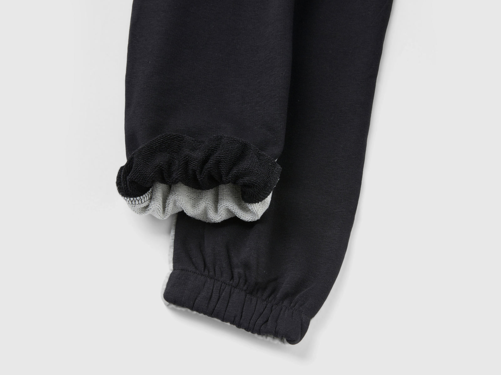 Joggers color block da bambina nero 3 | Benetton Outlet
