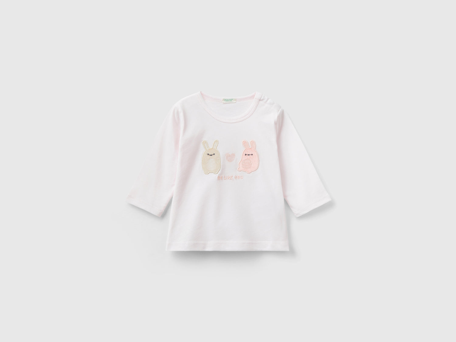 Maglietta con stampa animaletti da neonato rosa tenue | Benetton Outlet
