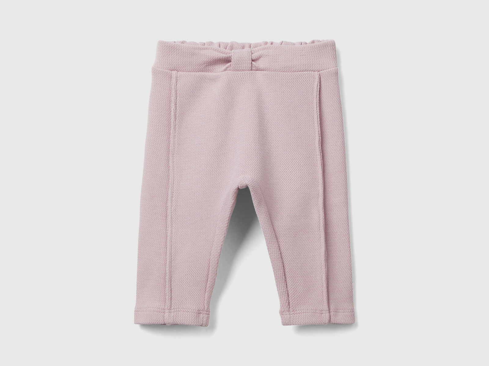 Pantalones con nudo en la cintura da neonato rosa | Benetton Outlet