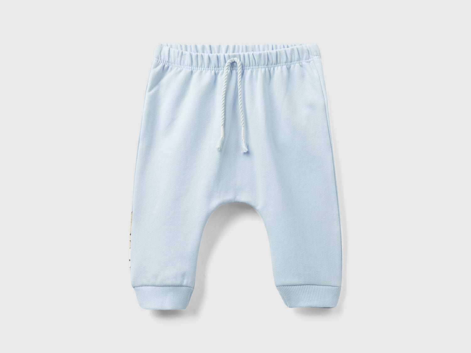 Pantalón sudadera cálido con bolsillo da neonato celeste | Benetton Outlet