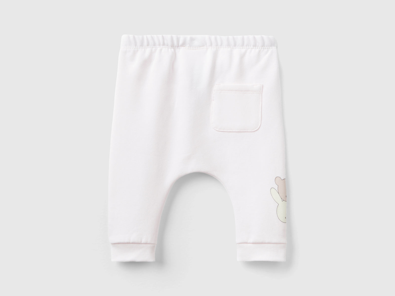 Pantaloni in calda felpa con taschino da neonato rosa tenue 2 | Benetton Outlet
