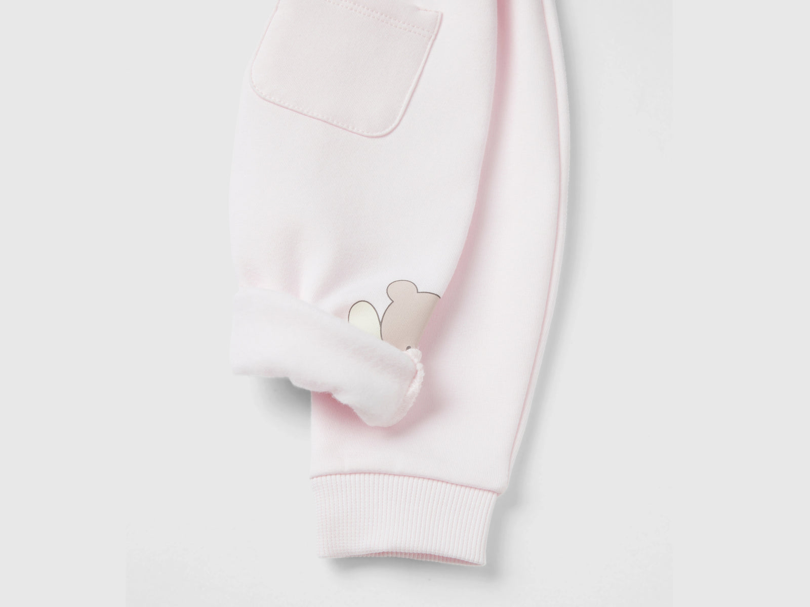 Pantaloni in calda felpa con taschino da neonato rosa tenue 3 | Benetton Outlet