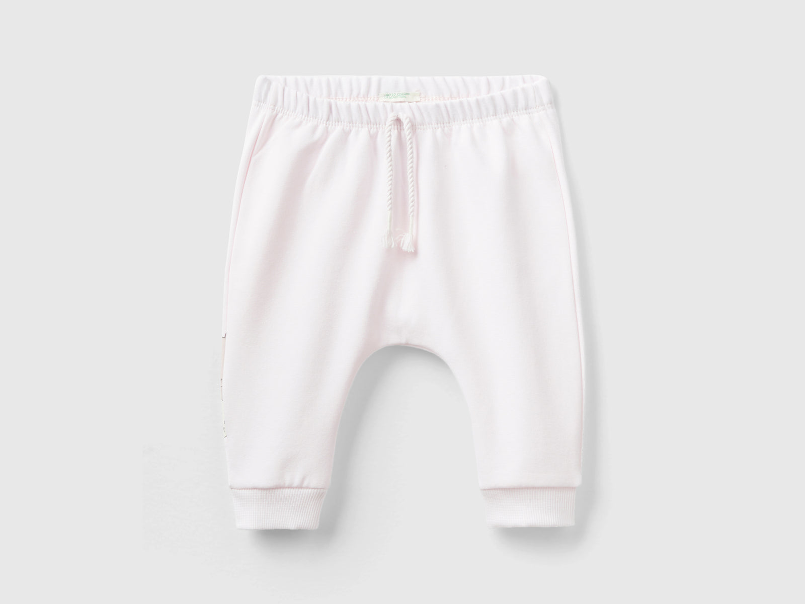Pantaloni in calda felpa con taschino da neonato rosa tenue | Benetton Outlet