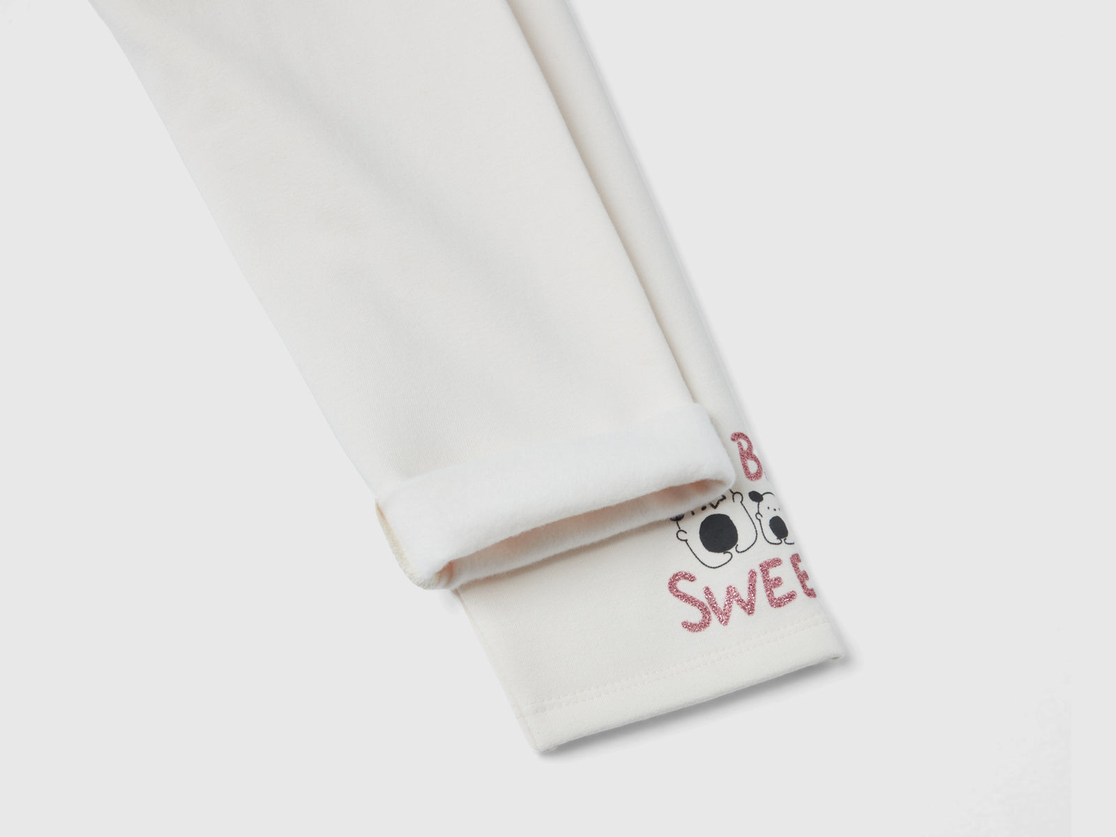 Warm leggings with glitter print da bimba bianco panna 2 | Benetton Outlet