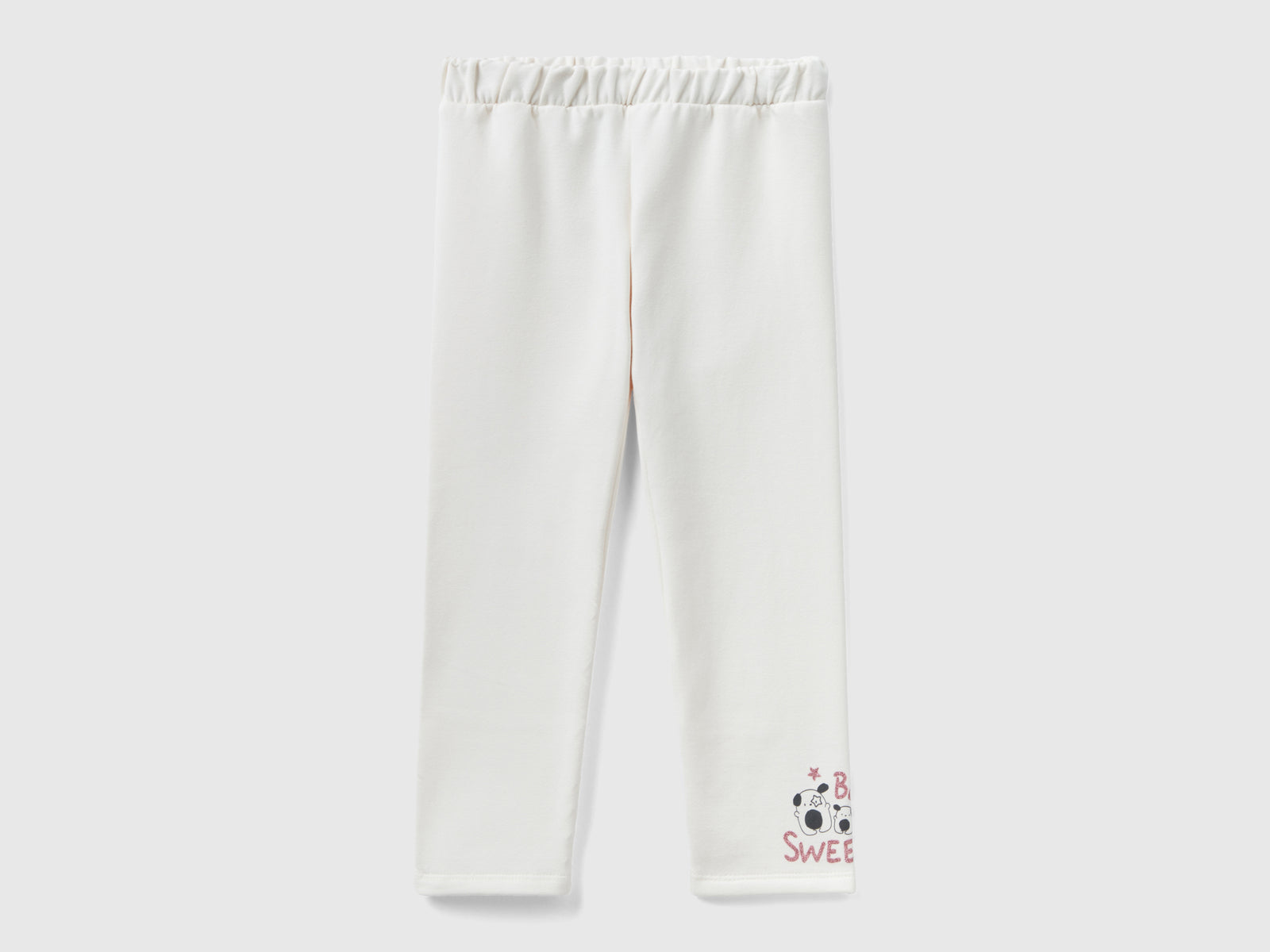 Warm leggings with glitter print da bimba bianco panna | Benetton Outlet