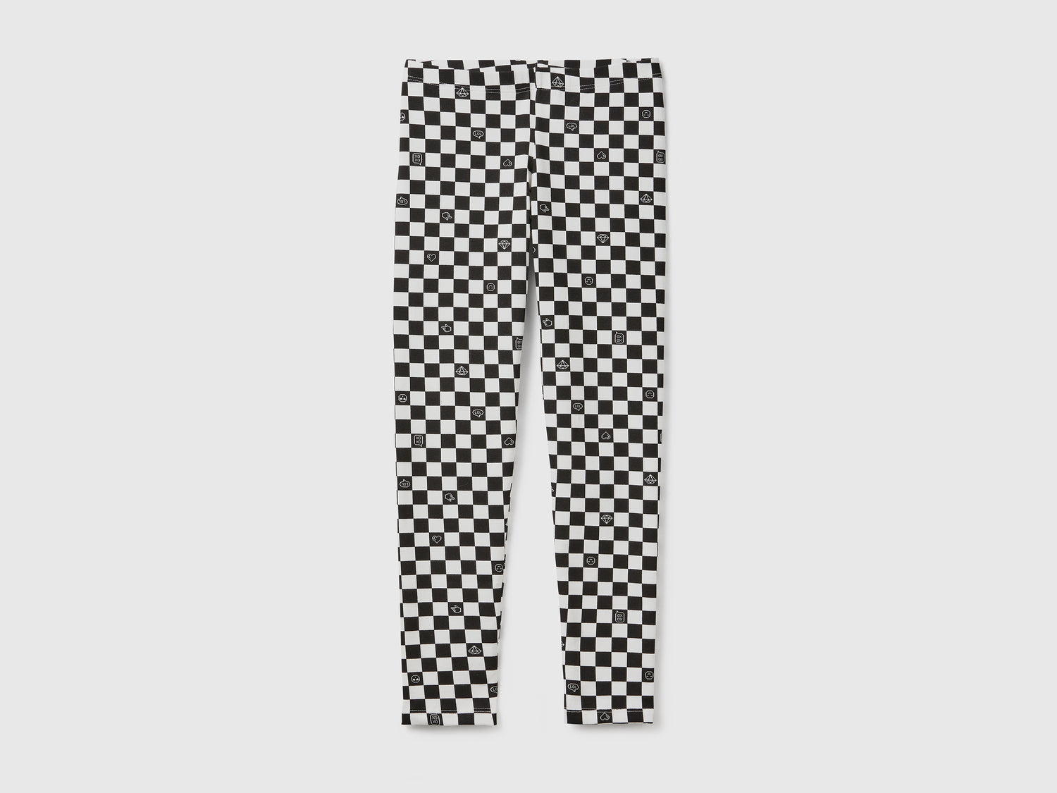 Leggings a scacchi in cotone stretch da bambina nero | Benetton Outlet