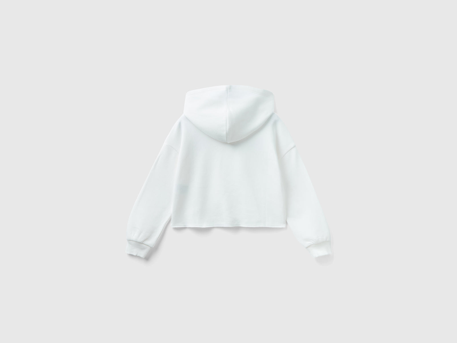 Felpa con cappuccio e paillettes da bambina bianco panna 2 | Benetton Outlet