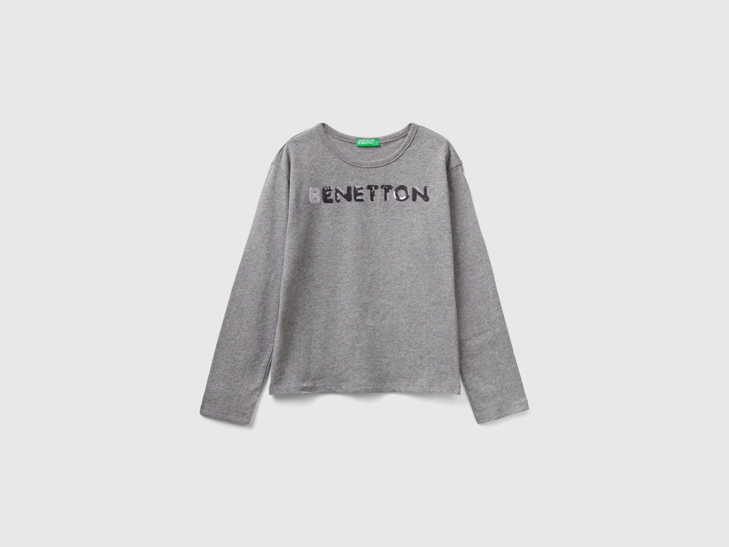 T-shirt in caldo cotone bio con paillettes da bambina grigio scuro | Benetton Outlet