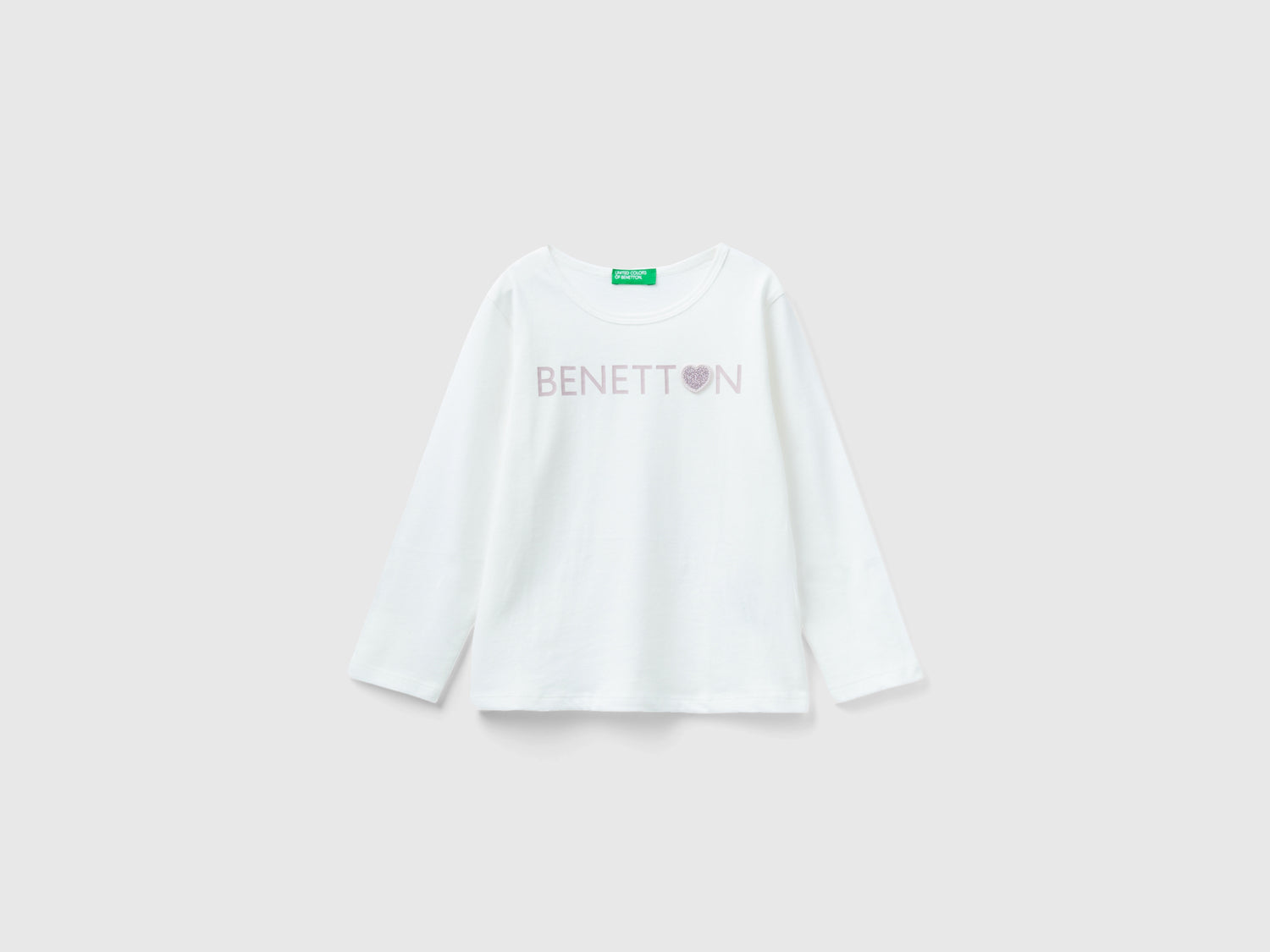 T-shirt con stampa glitter in cotone bio da bimba bianco panna | Benetton Outlet