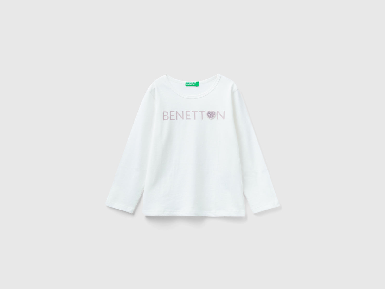 T-shirt con stampa glitter in cotone bio da bimba bianco panna | Benetton Outlet