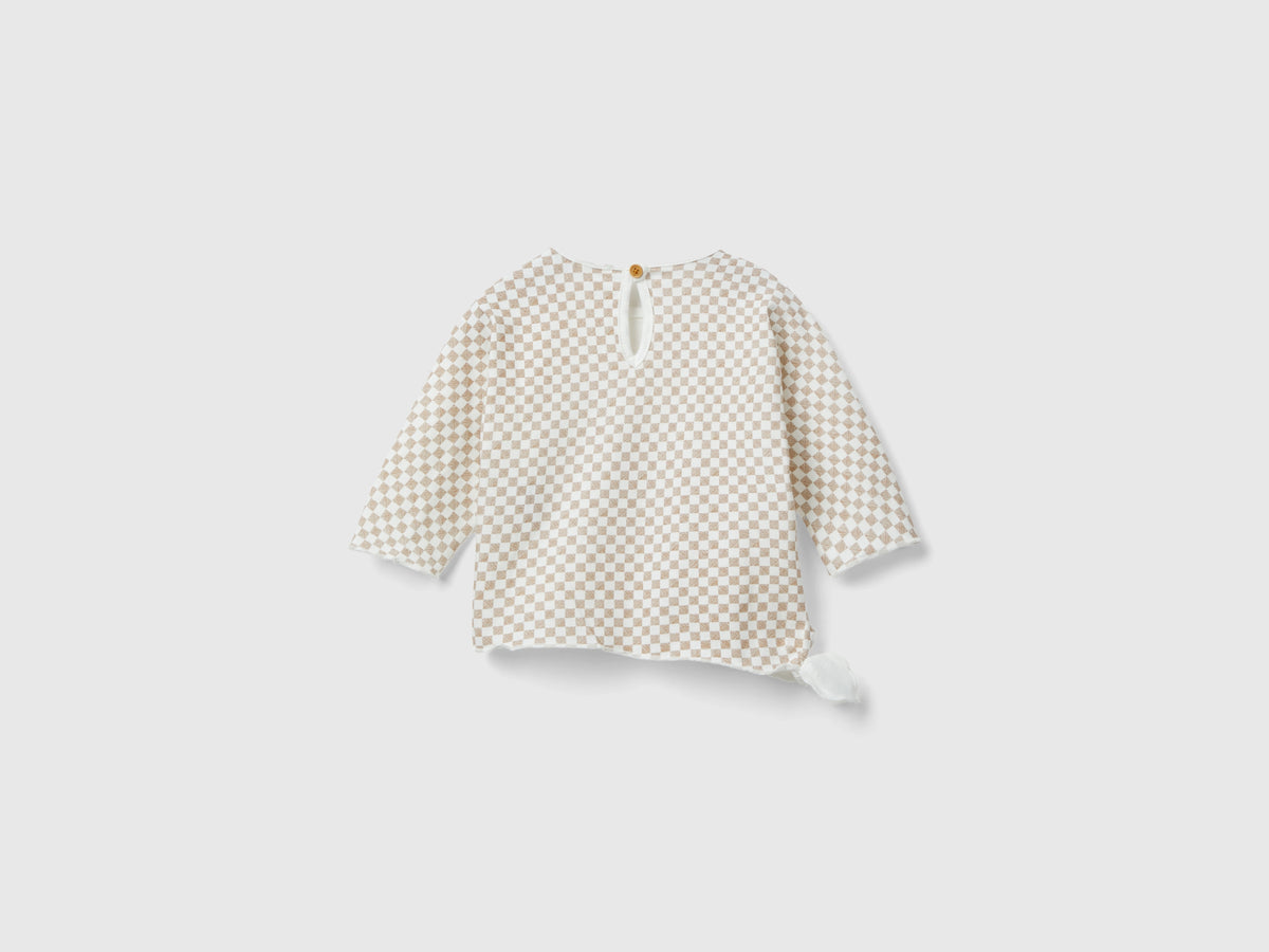 T-shirt optical con nodo