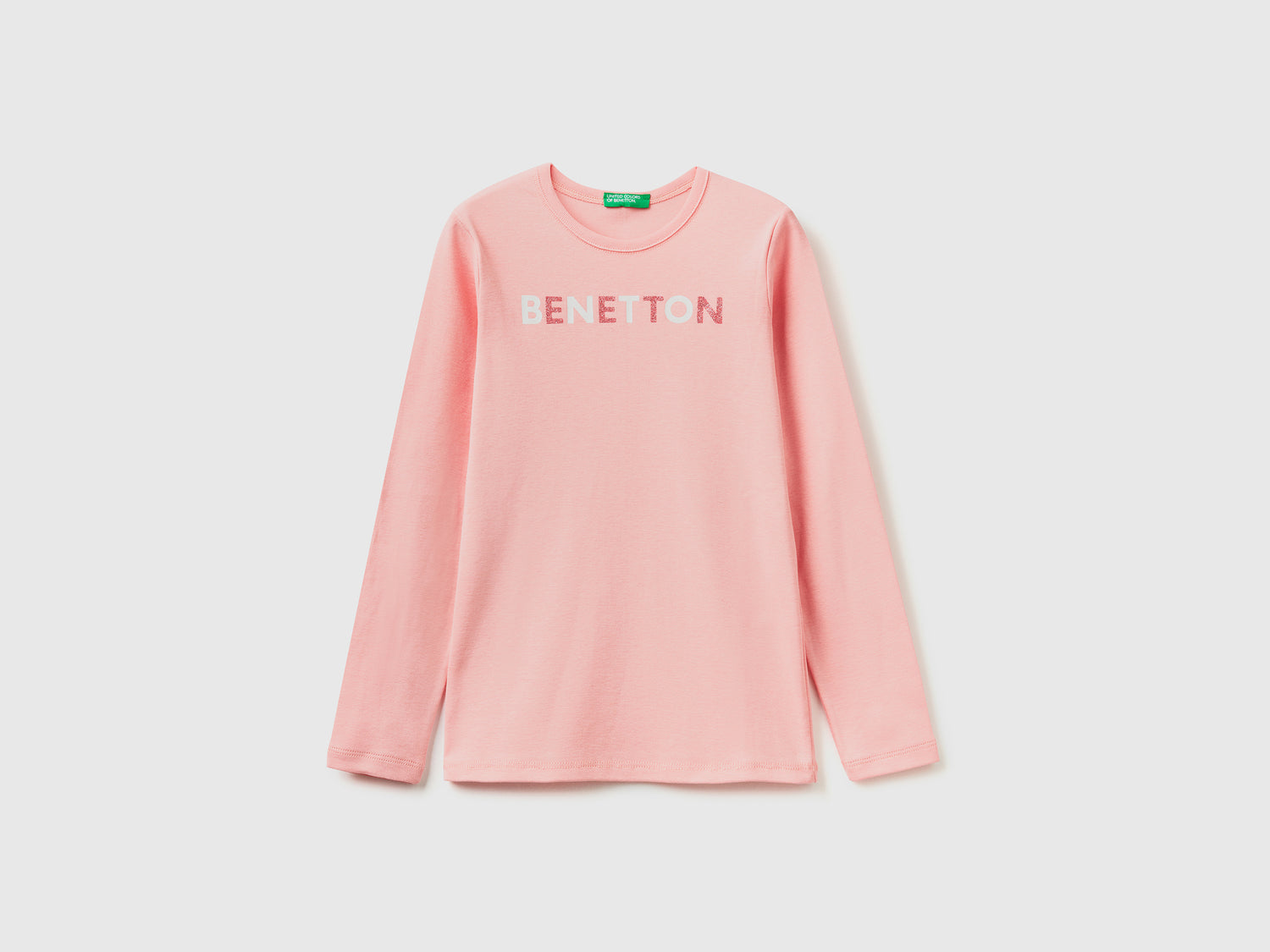T-shirt manica lunga con stampa glitter da bambina rosa | Benetton Outlet