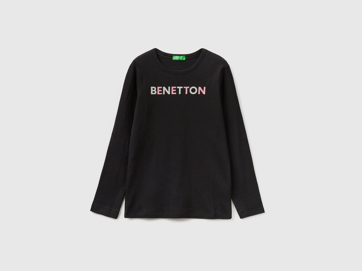 T-shirt manica lunga con stampa glitter da bambina nero | Benetton Outlet