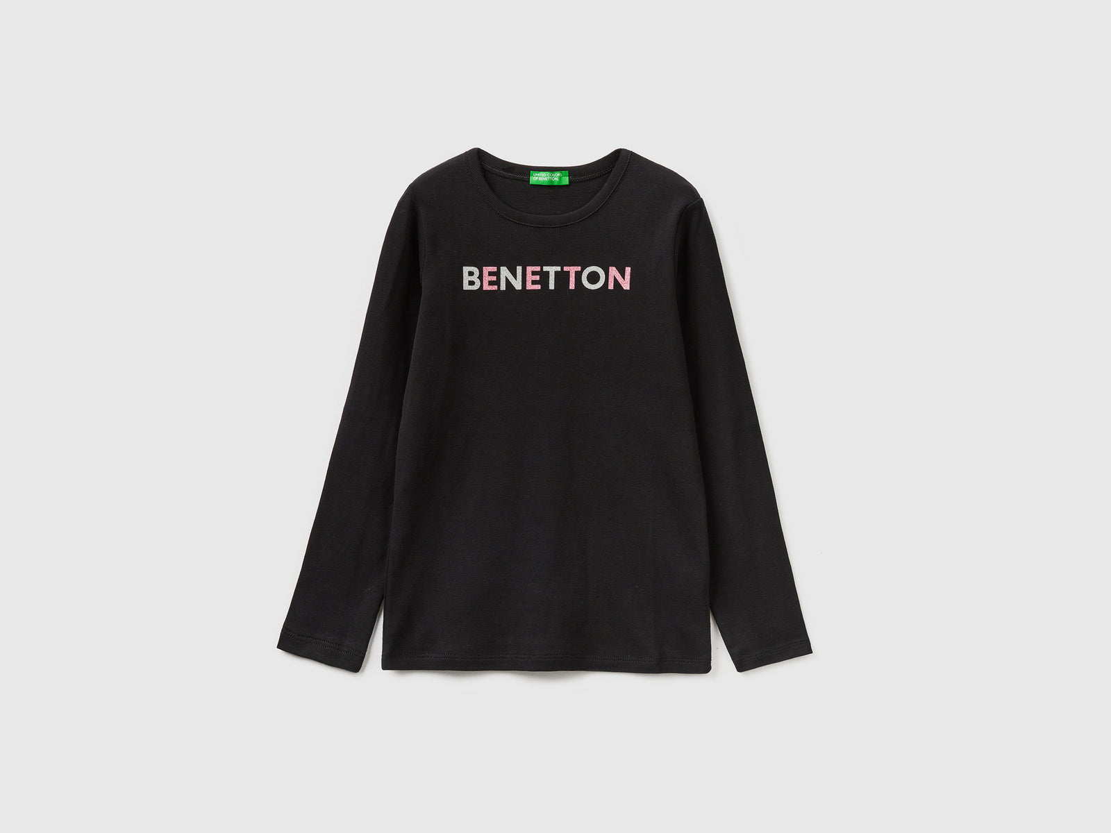 T-shirt manica lunga con stampa glitter da bambina nero | Benetton Outlet