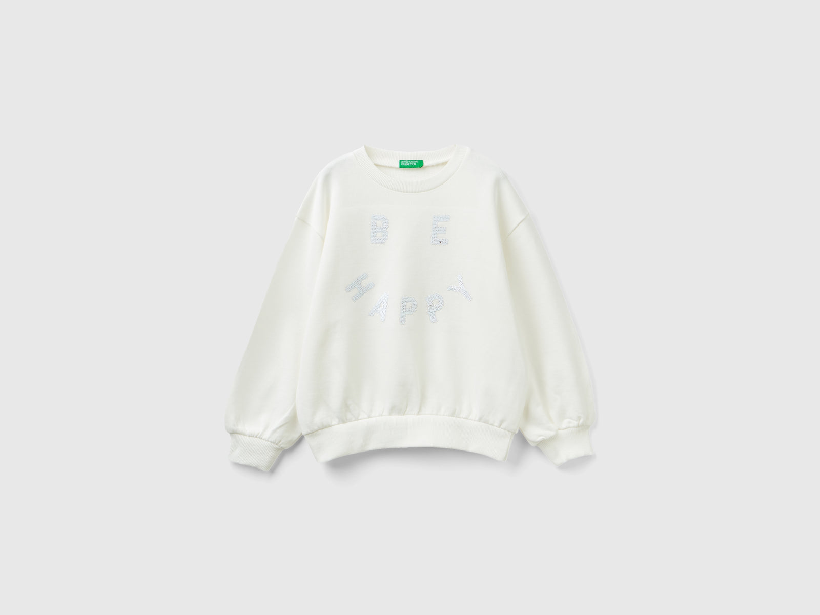 Felpa con paillettes reversibili da bambina bianco panna | Benetton Outlet