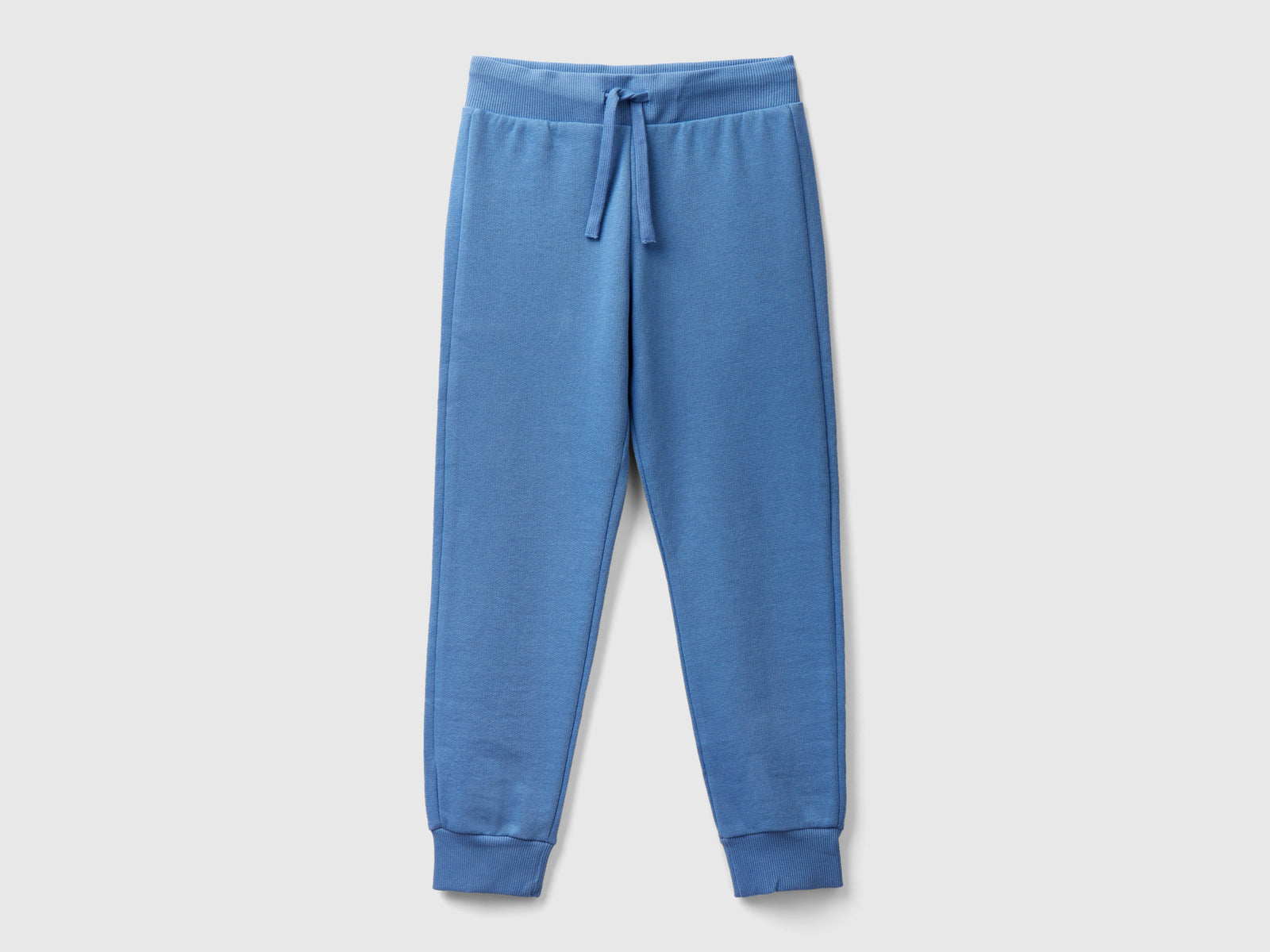 Pantaloni sportivi con coulisse da bambino azzurro | Benetton Outlet