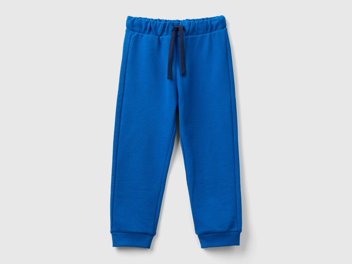 Pantaloni in felpa con taschino da bimbo bluette | Benetton Outlet