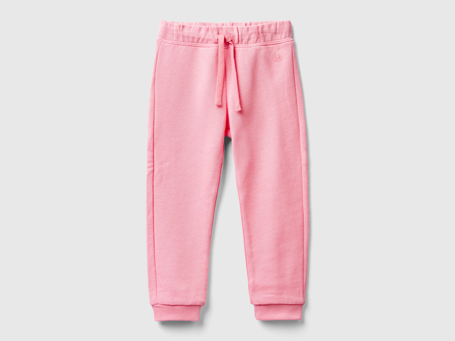 Pantaloni in felpa di cotone bio da bimba rosa | Benetton Outlet
