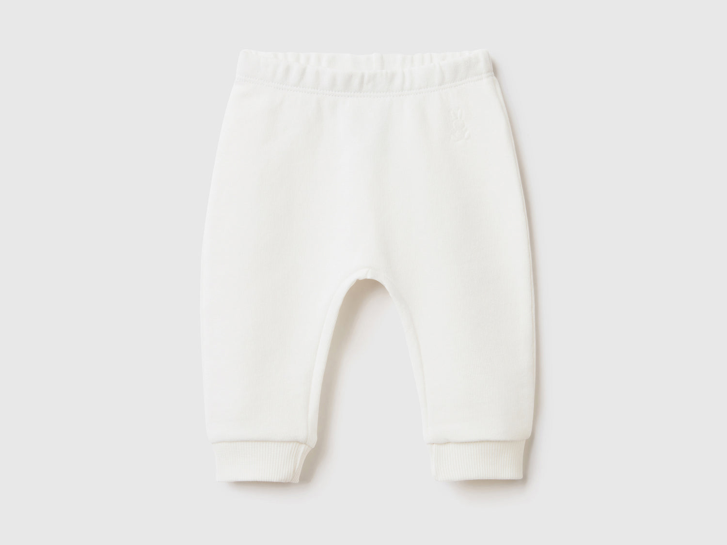 Pantaloni in felpa di cotone biologico da neonato bianco panna | Benetton Outlet