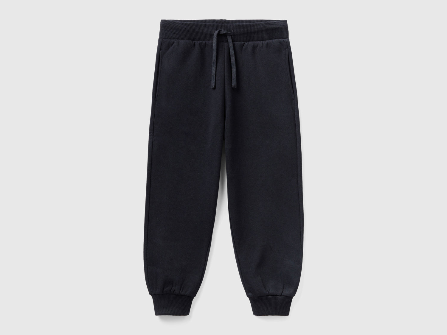Joggers in tessuto riciclato da bambino nero | Benetton Outlet