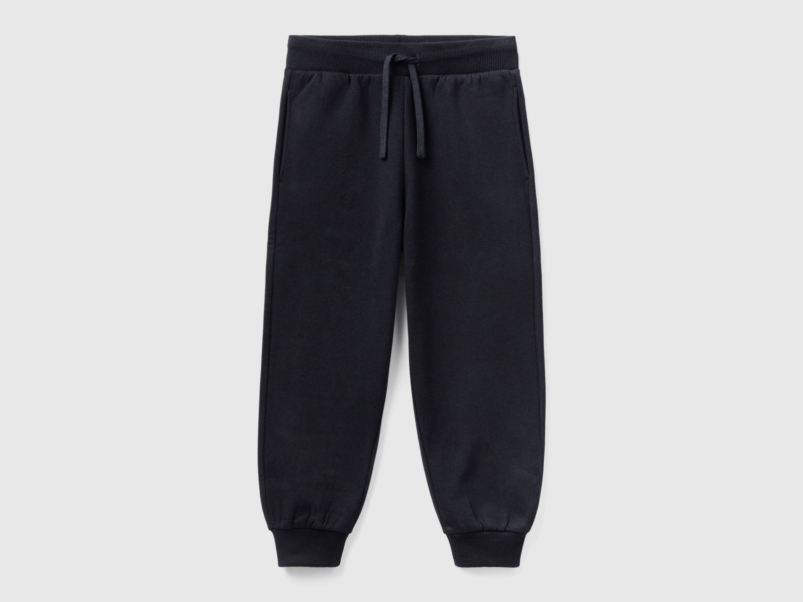 Joggers in tessuto riciclato da bambino nero | Benetton Outlet