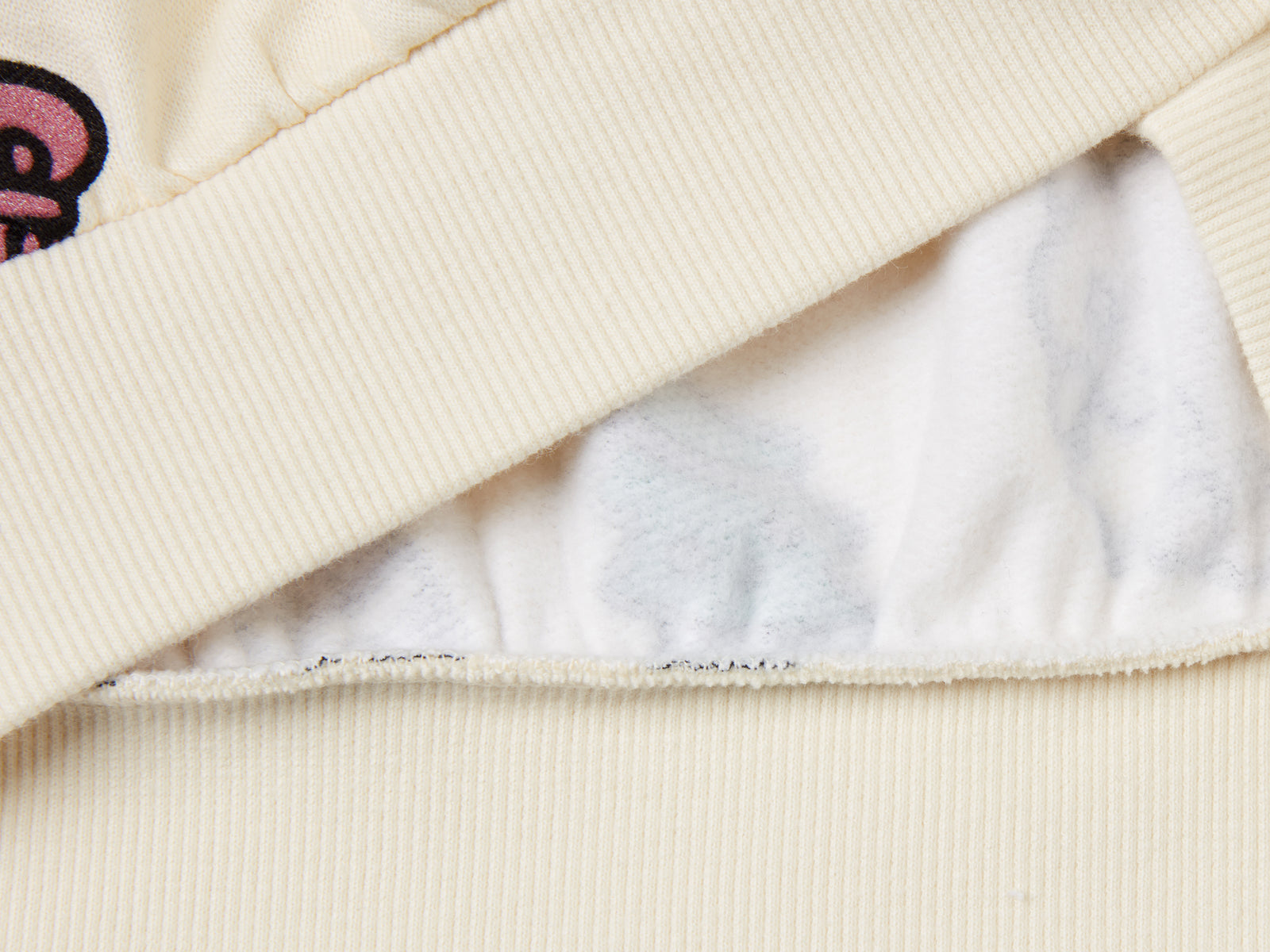 Calda felpa natalizia over fit da bambina beige 2 | Benetton Outlet