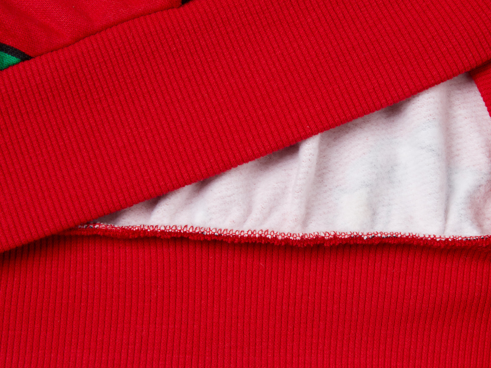 Calda felpa natalizia over fit da bambina rosso 2 | Benetton Outlet