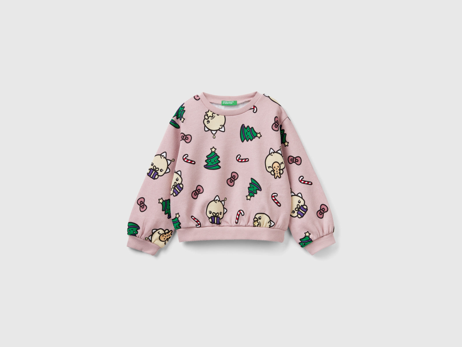 Calda felpa natalizia over fit da bimba rosa | Benetton Outlet
