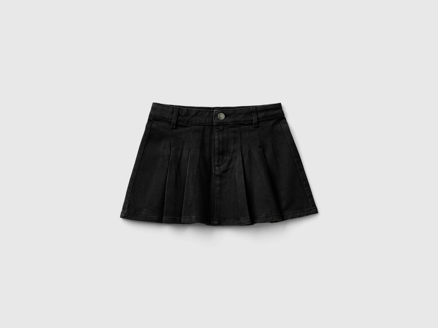 Minigonna a pieghe da bambina nero | Benetton Outlet