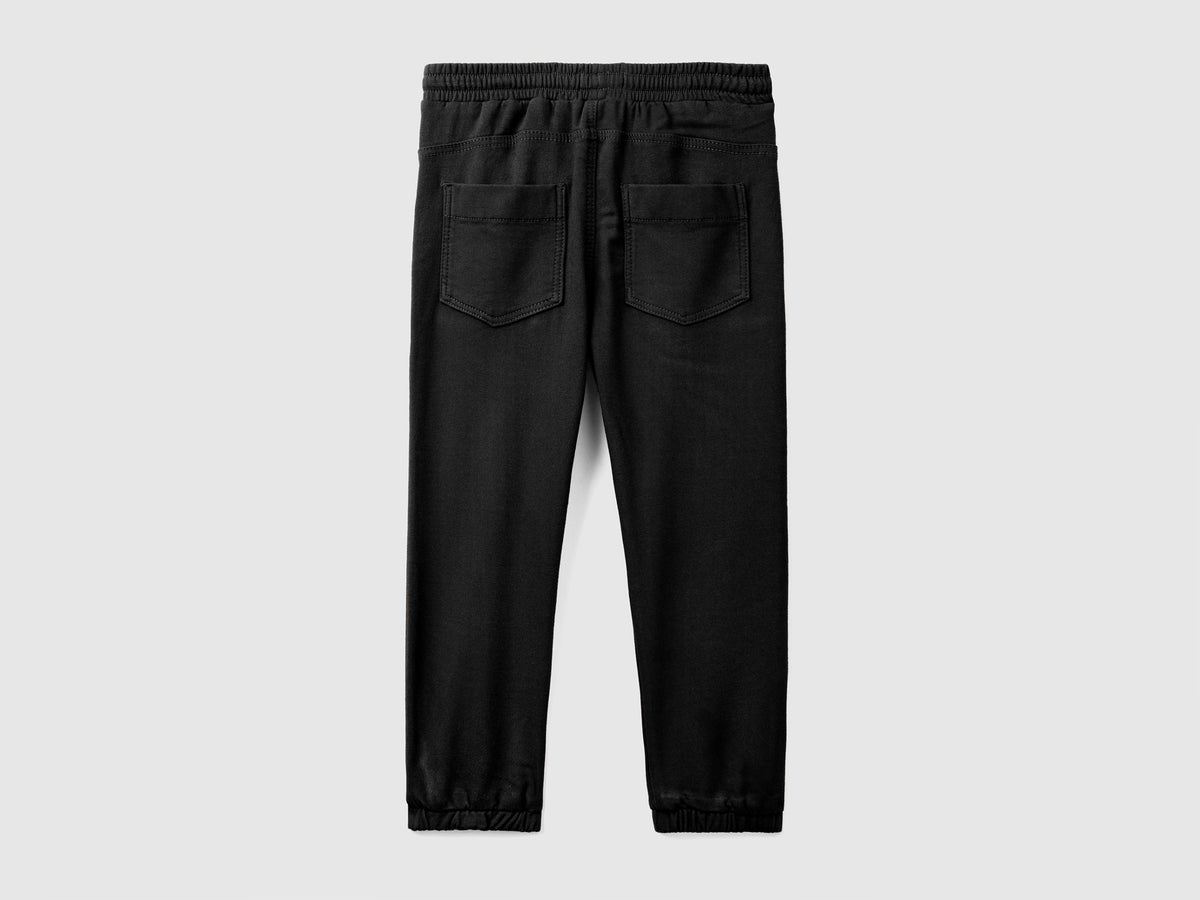 Joggers con coulisse e maxi tasche