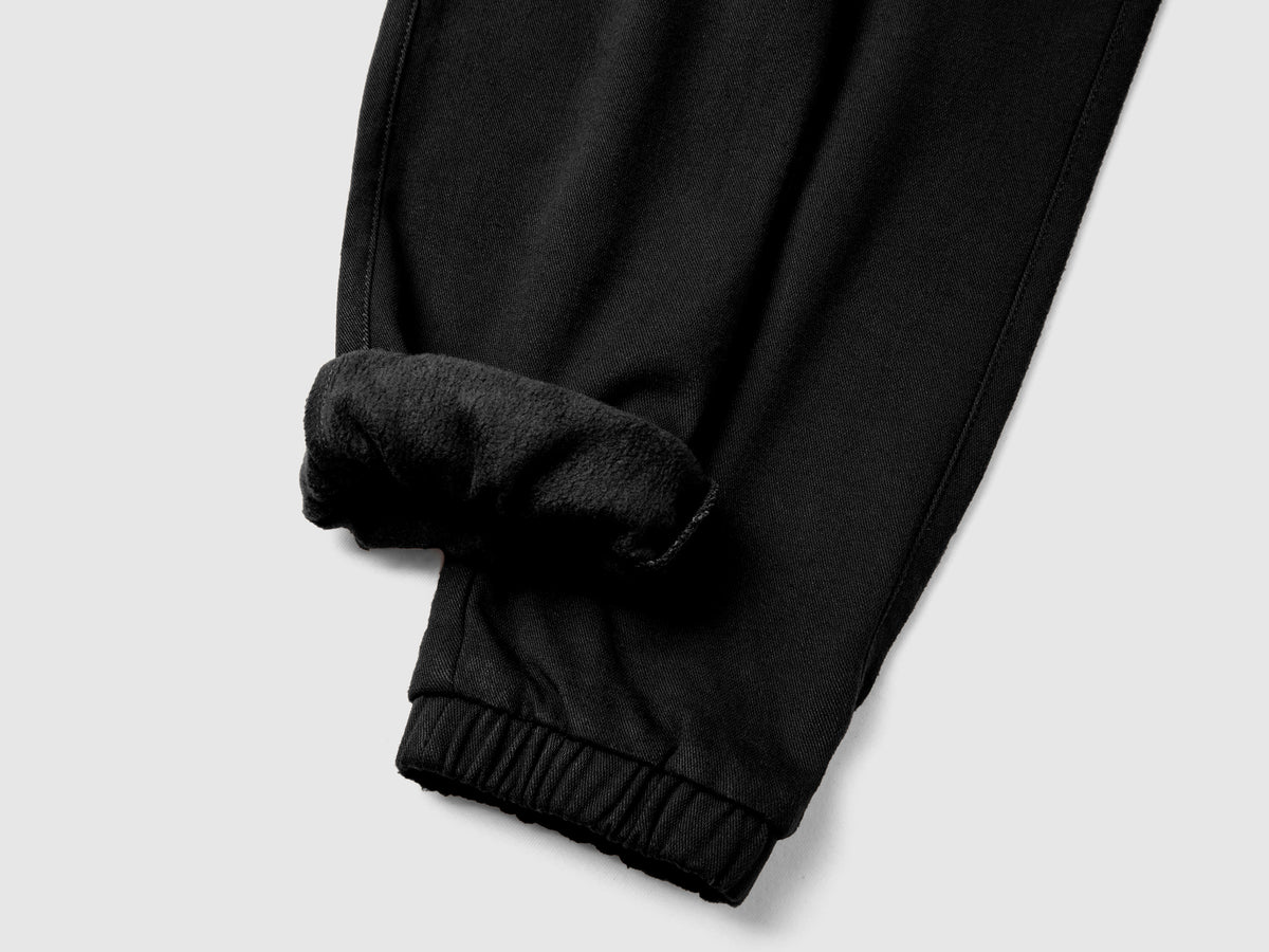 Joggers con coulisse e maxi tasche