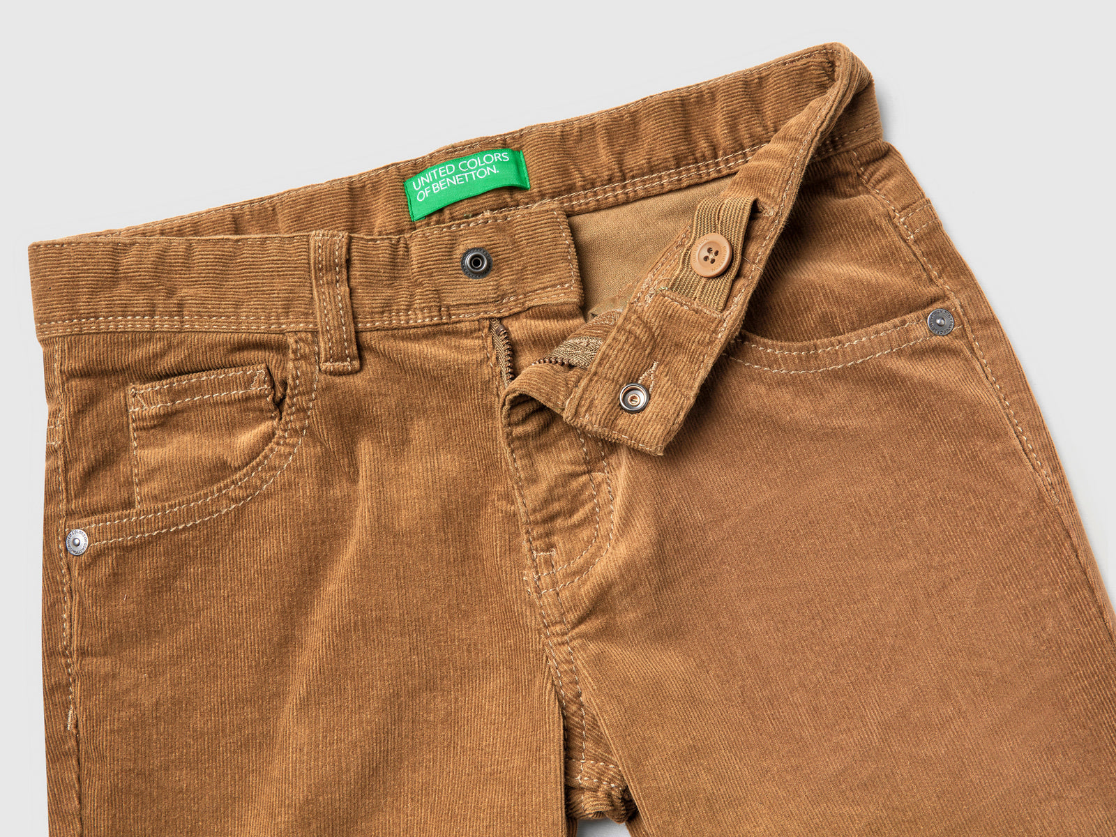 Pantaloni slim fit in velluto stretch da bambino beige 3 | Benetton Outlet