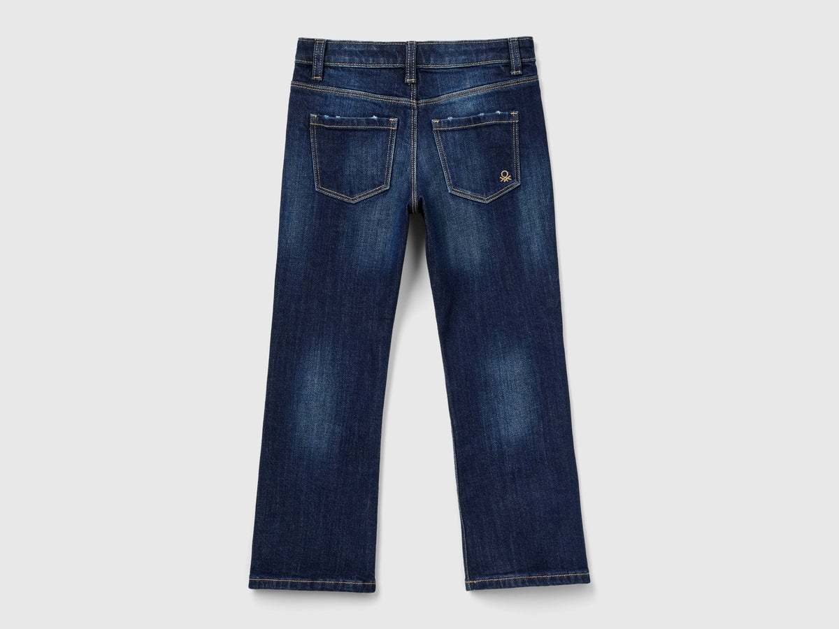 Jeans cinque tasche a zampa
