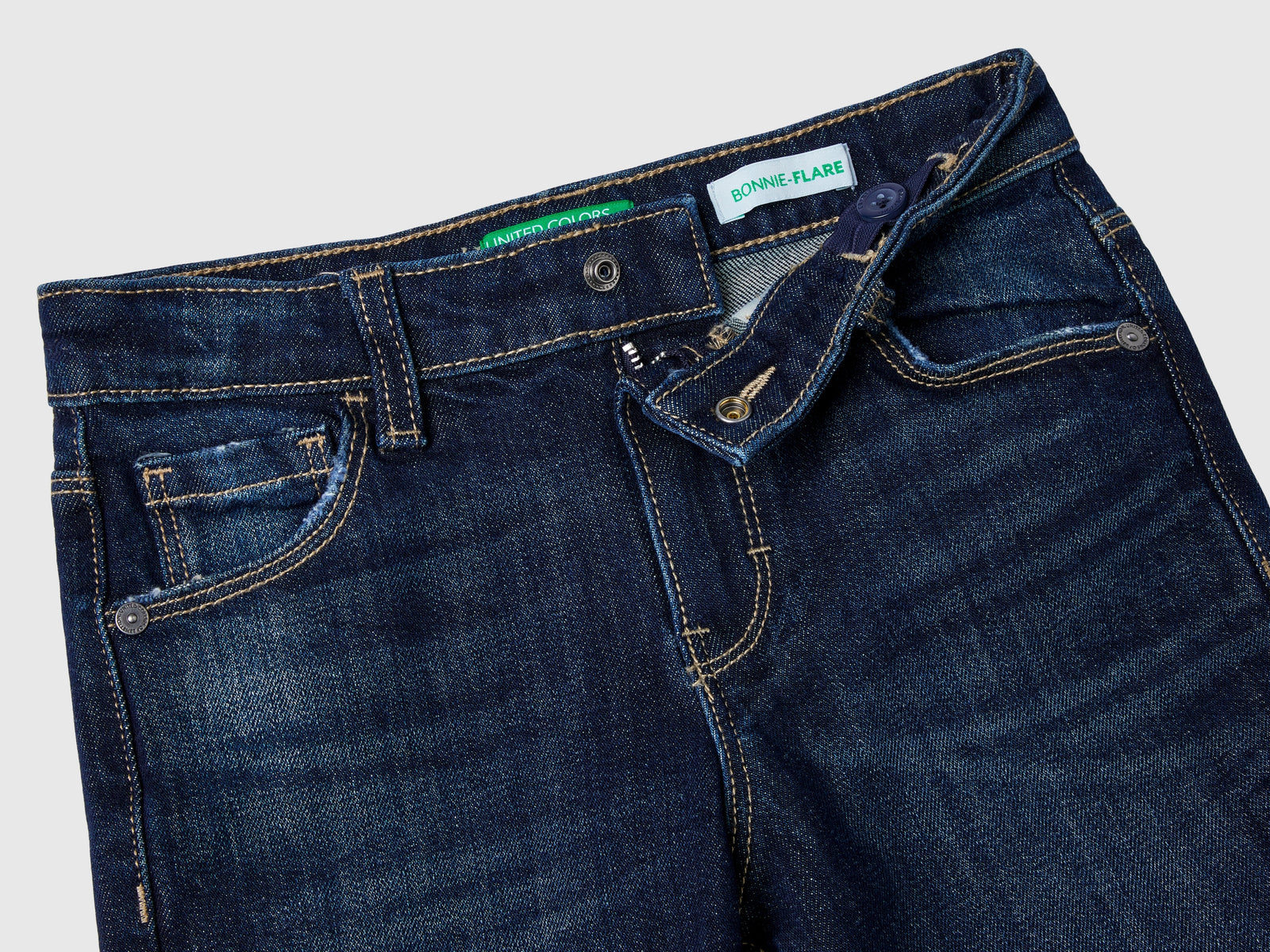 Jeans cinque tasche a zampa da bambina blu scuro 3 | Benetton Outlet