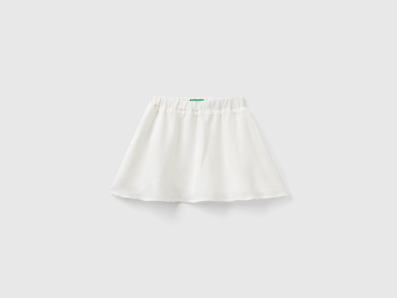 Minigonna in mito viscosa con lurex da bimba bianco panna | Benetton Outlet