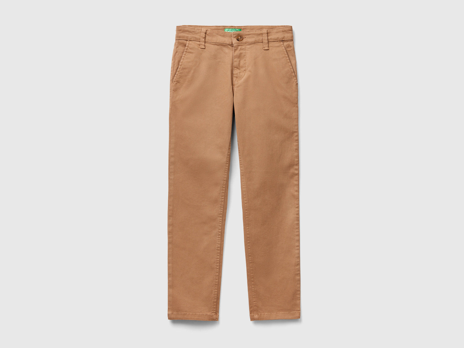 Chino slim fit in cotone stretch da bambino beige | Benetton Outlet