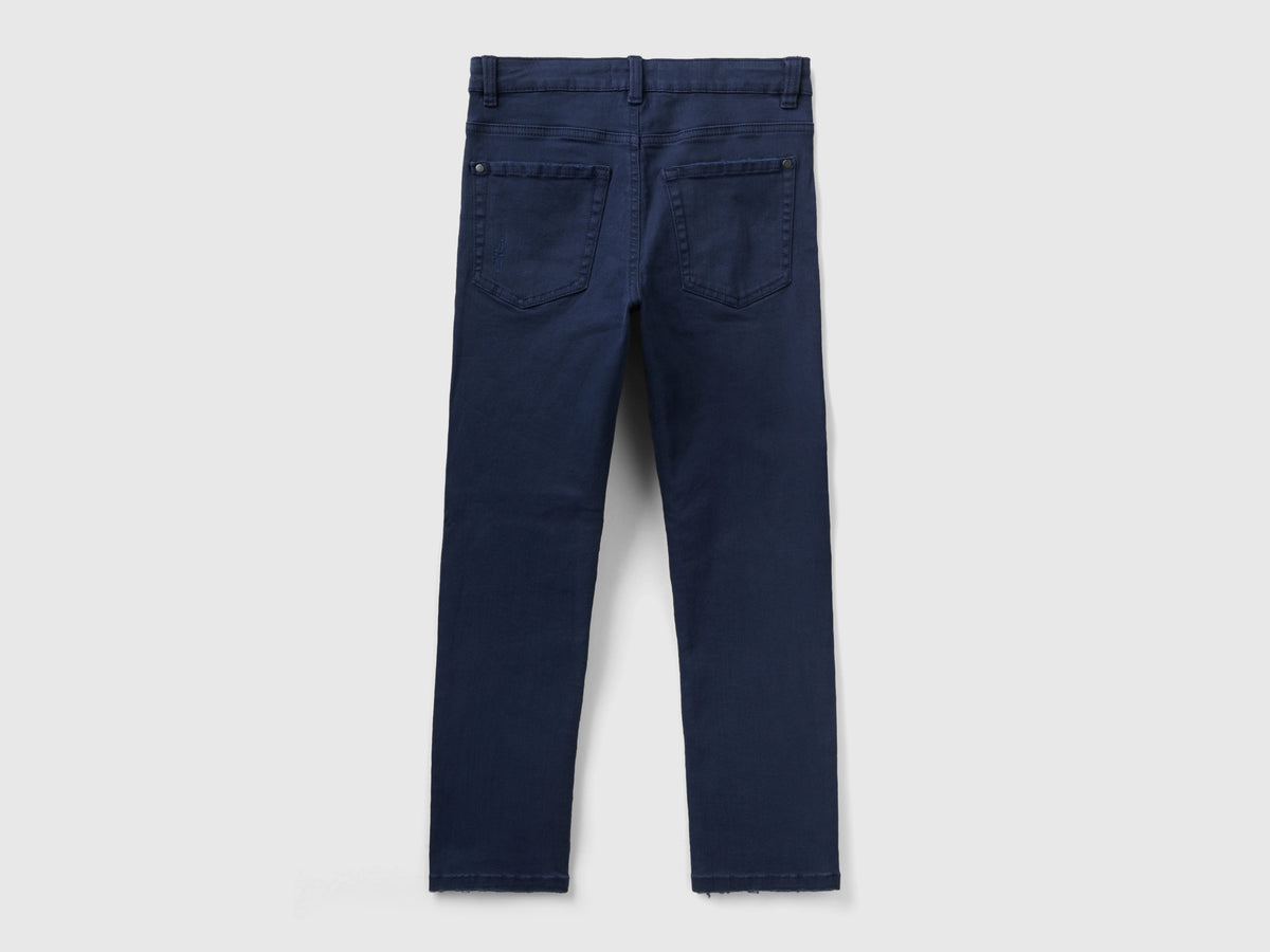 Jeans stretch con rotture